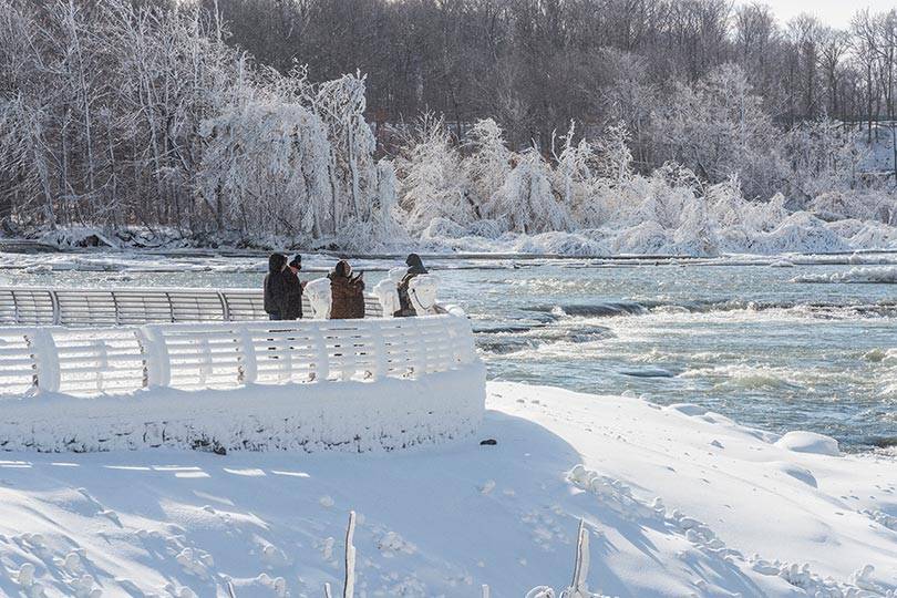 Experience the serenity of Niagara Falls State Park in the winter